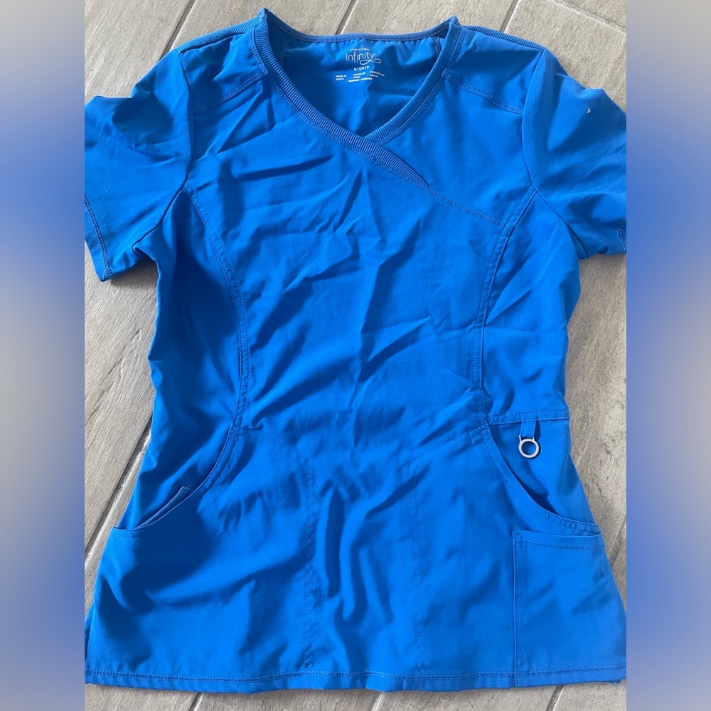 Cherokee Infinity blue scrub top. Size small